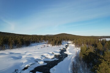 Frozen river near Inari lake, Lapland Finland