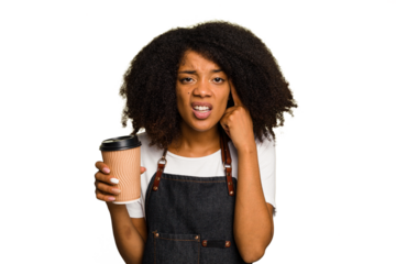 Young african american woman barista holding a takeaway coffee showing a disappointment gesture with forefinger.