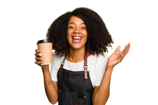 Young african american woman barista holding a takeaway coffee receiving a pleasant surprise, excited and raising hands.