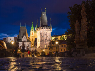 View of Charles Bridge in Prague in the night, Czech Republic. popular tourist attraction. Travel...