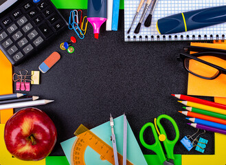 Soon to school, stationery on the background of a blackboard. copy space