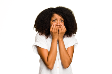 Young African American woman isolated biting fingernails, nervous and very anxious.