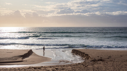 Cloudy sky on Mollymook beach, near Uladulla, Australia