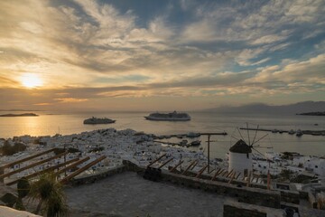 Beautiful Mykonos island surrounded by the sea and evening sky in the background