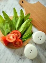 Healthy Eating. Breakfast in the form of greens, tomatoes and boiled eggs