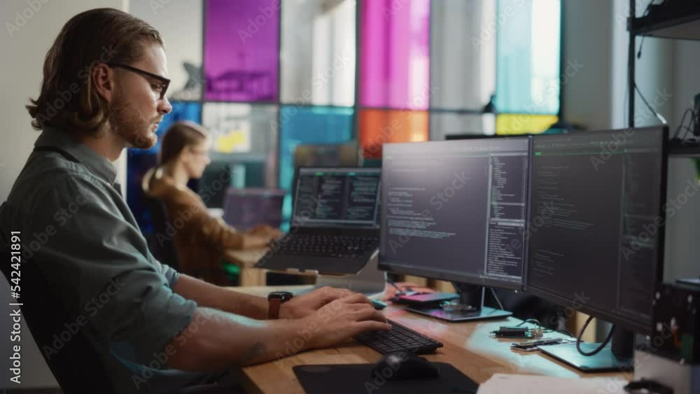 Poster Professional Male Data Scientist Writing Code on Desktop Computer in Stylish Coworking Office Space. Caucasian Man Using Software to Analyze Information From Internet and Improve Performance.