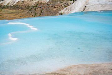 White travertines, calcite cliff of Pamukkale in Turkey