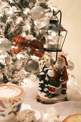 Cup of coffee among the Christmas decorations