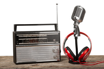 Retro style microphone and headphones on  background