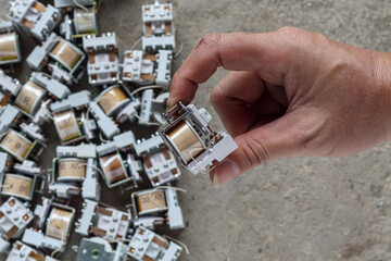 relay device that is stored for screening of precious metals before silver is extracted from alloy within the relay which is an electronic device responsible for interconnecting electrical circuits.