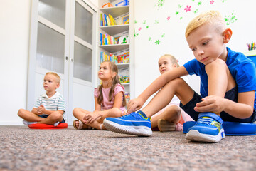 Child occupational therapy background. Elementary age children in group therapy. Pupils in class...