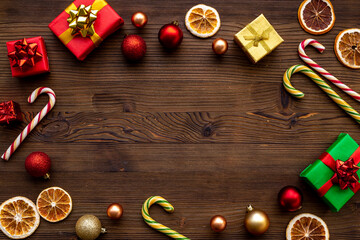 Marry Christmas greeting card background with decoration baubles and gift boxes