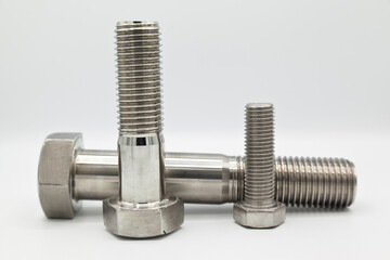 Stainless steel metal with metric A4 bolts, industrial metal part, isolated on white background