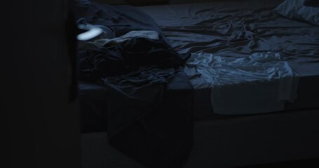 Human left messy bed after getting off early in morning, motion view