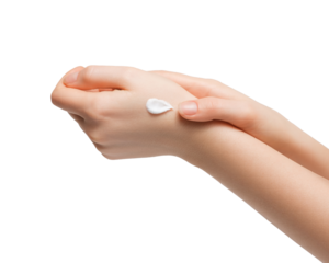Woman applying hand cream for hands.