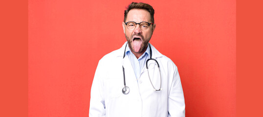 middle age man feeling disgusted and irritated and tongue out. physician concept