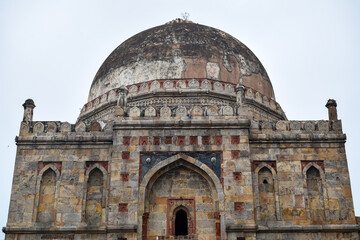 Fototapeta premium Mughal Architecture inside Lodhi Gardens, Delhi, India, Beautiful Architecture Inside Three-domed mosque in Lodhi Garden is said to be the Friday mosque for Friday prayer, Lodhi Garden Tomb