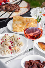 Khinkali and pasties with wine