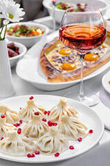 Khinkali and khachapuri with wine