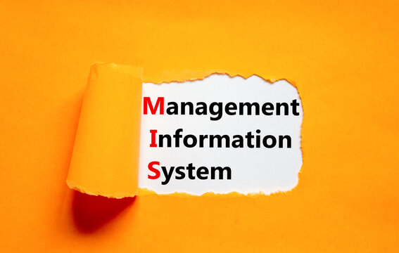 MIS management information system symbol. Concept words MIS management information system on white paper on a orange background. Business MIS management information system concept. Copy space.