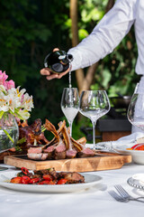 Grilled lamb ribs and wine