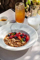 Breakfast granola with berries and yogurt.