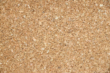 Brown yellow color of cork board textured background with blank copy space