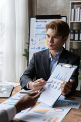 Young man freelancer using laptop online working , happy casual guy typing on notebook