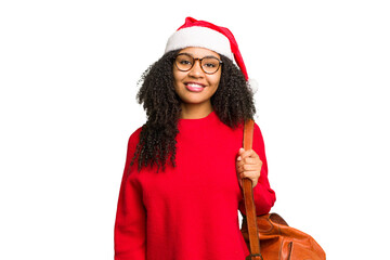 Young african american student woman wearing a christmas hat isolated happy, smiling and cheerful.