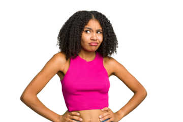 Young african american woman isolated confused, feels doubtful and unsure.