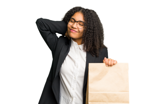 Young african american business woman holding a take away bag isolated touching back of head, thinking and making a choice.