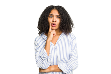 Young african american woman isolated looking sideways with doubtful and skeptical expression.
