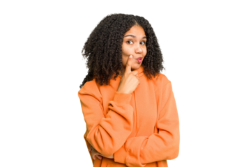 Young african american woman isolated contemplating, planning a strategy, thinking about the way of a business.