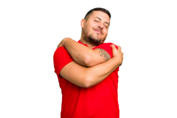 Young caucasian man isolated hugs, smiling carefree and happy.