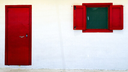 red window with red shutters