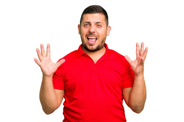 Young caucasian man isolated screaming to the sky, looking up, frustrated.