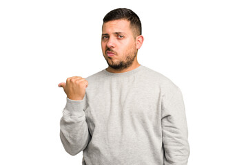 Young caucasian man isolated shocked pointing with index fingers to a copy space.