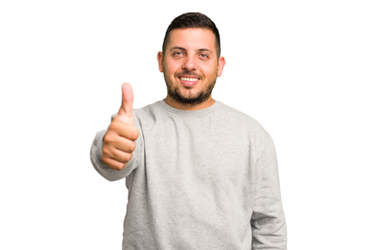 Young caucasian man isolated smiling and raising thumb up