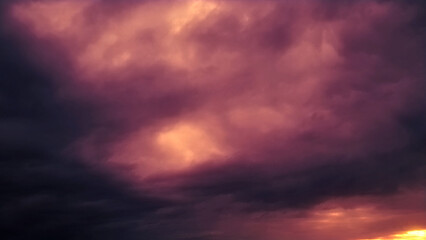 Obraz premium Dark rose and orange heavy sundown clouds - abstract 3D illustration