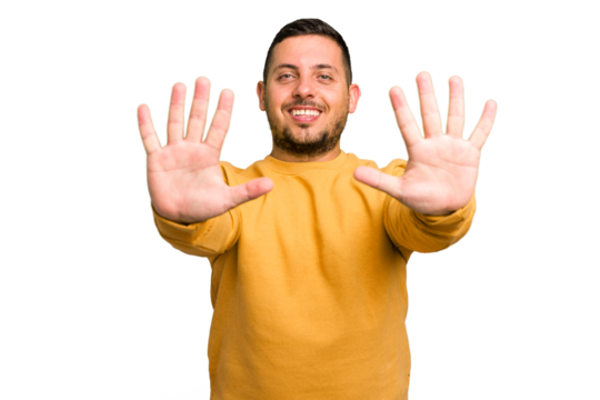 Young caucasian man isolated showing number ten with hands.
