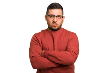 Young caucasian man isolated frowning face in displeasure, keeps arms folded.