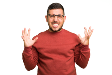 Young caucasian man isolated screaming to the sky, looking up, frustrated.