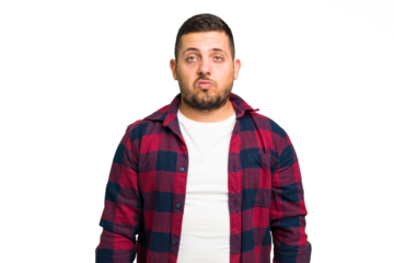 Young caucasian man isolated sad, serious face, feeling miserable and displeased.