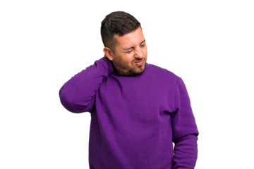 Young caucasian man isolated having a neck pain due to stress, massaging and touching it with hand.