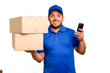 Delivery caucasian man delivering packages and using his mobile phone isolated