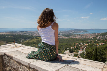 Girl in front of an mediterranean view