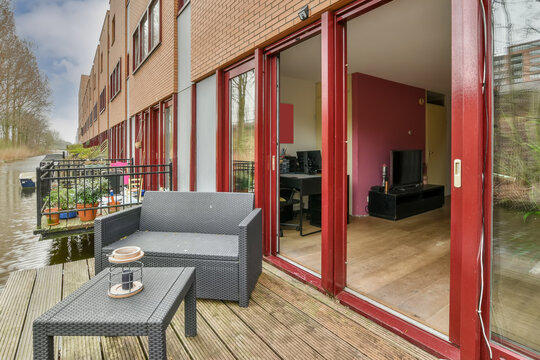 Backyard of boathouse balcony with seats