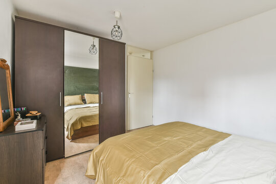 Interior of modern bedroom with bed
