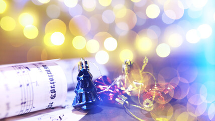 Christmas carol with jingle bells and candles