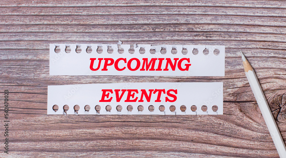 Poster background for text. white strips of paper with the text upcoming events and a white pencil next to 